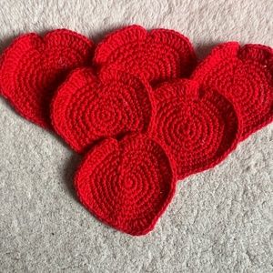 Handmade in crochet coasters heart shape.